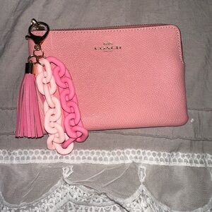 Coach Pink Textured Wristlet with Tassel and Chain